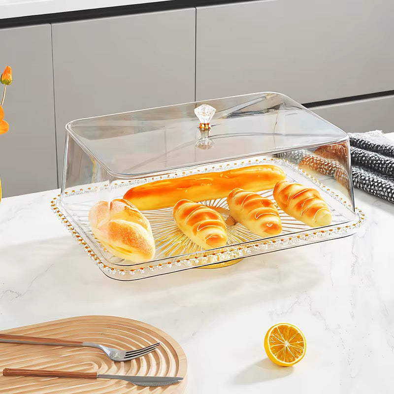 Présentoir à Gâteau Élégant avec Cloche Transparente – Finitions Dorées et Bouton Cri