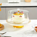 Présentoir à Gâteau Élégant avec Cloche Transparente – Finitions Dorées et Bouton Cri