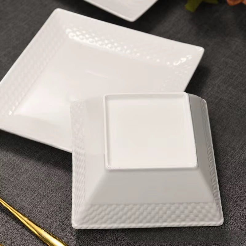 Service d’assiette carreaux et bol en céramique blanche